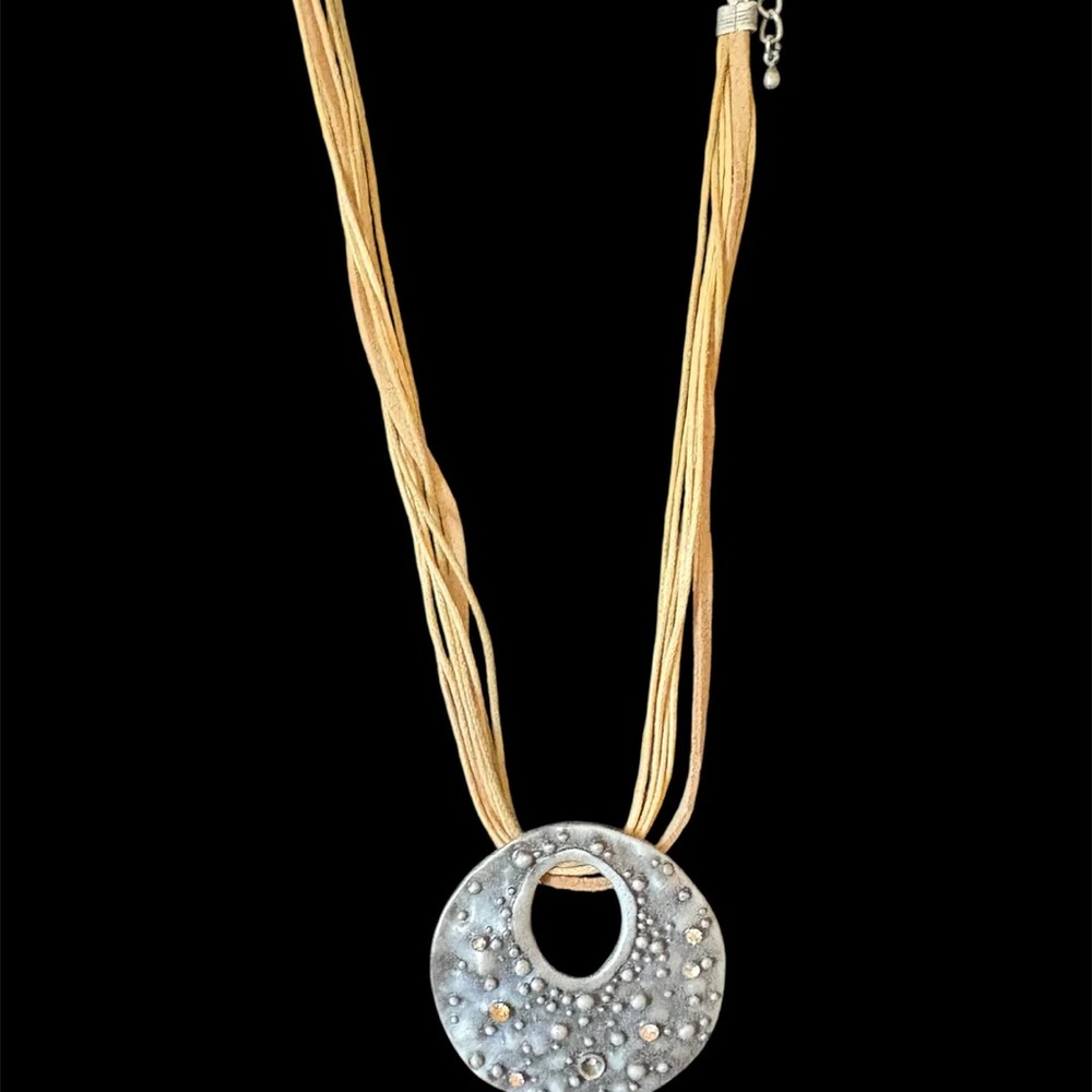Multi-Strand Cord Necklace With Large Textured Metal Pendant